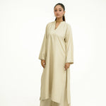 Beige long dress with heart embroidery on cuffs