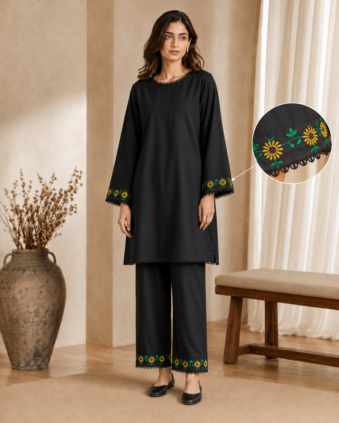 Close-up of sunflower embroidery on Sooraj Mukhi black kurta cuff